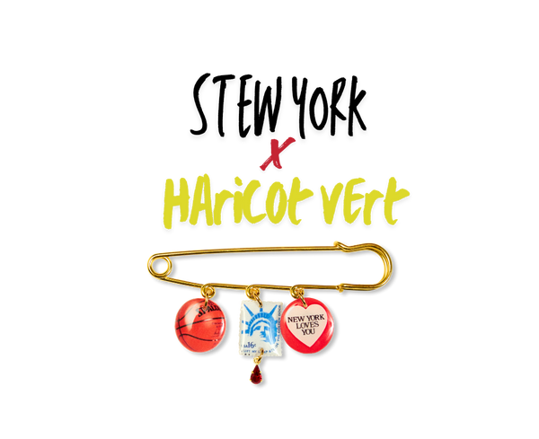 XL Safety Pin with colorful charms and 'Stew York x Haricot Vert' text on a white background