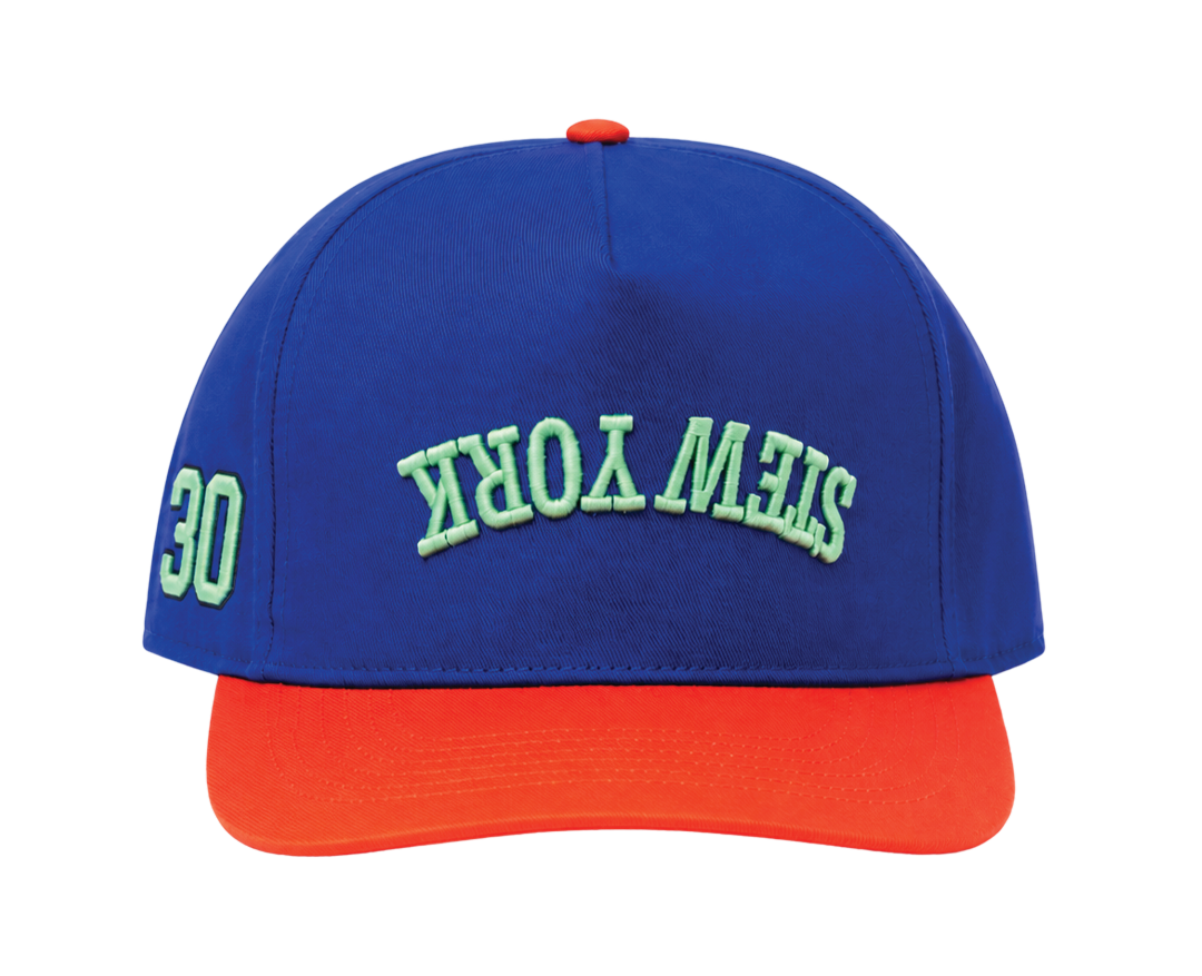 A structured baseball cap with a royal blue crown, a bright orange curved brim, and green embroidered text reading 'STEW YORK' on the front. The side shows the number '30' in green.